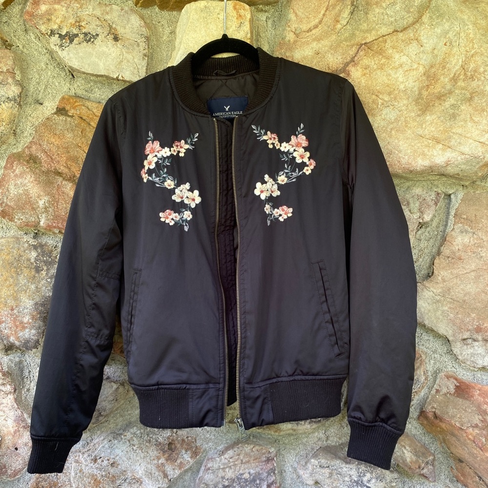 Black bomber jacket with embroidery detail